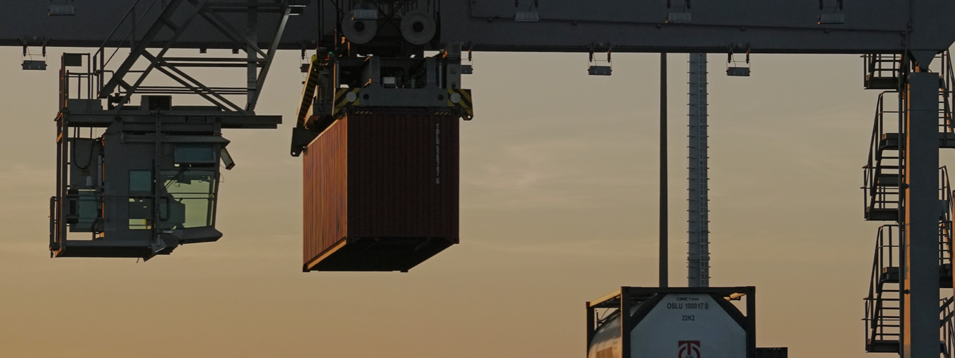 A container hangs on a crane