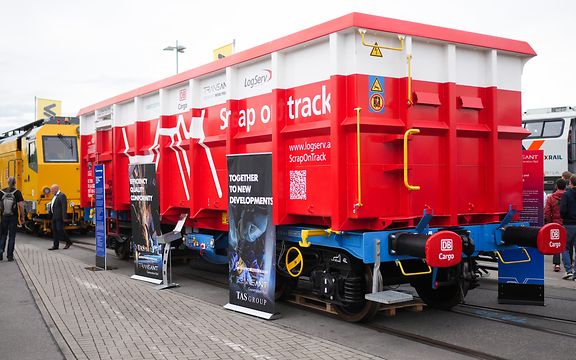 A scrap wagon as an exhibit on the outdoor area of InnoTrans 2024 in Berlin.